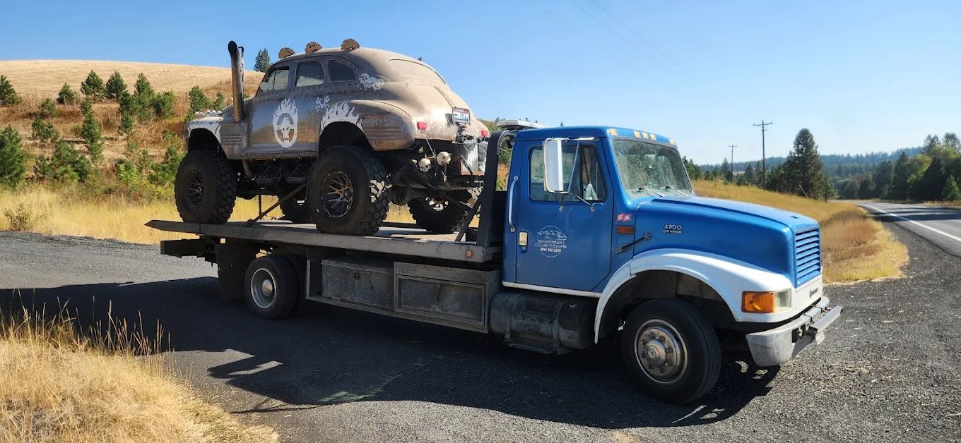 Custom monster truck build loaded on the Snoway flatbed